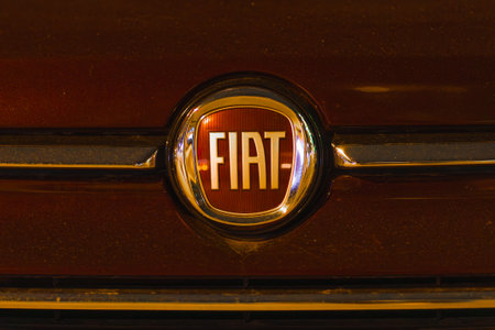 Istanbul, Turkey - August 9, 2023: Logo of the Italian automotive company FIAT on the radiator grille of the car.のeditorial素材
