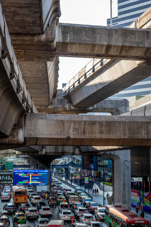 Bangkok-Thailand February 25 2024: Traffic jam on Bangkok street. Rush hours. Urban landscape in the...