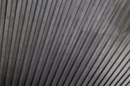 Abstract iron background. Building exterior. Industrial design. Grunge metal backgroundの写真素材