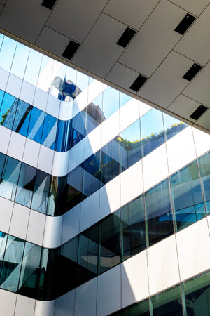 Modern architecture details background with metal and glass. Shopping mall, office building or...