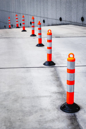 Road cones mark the path. Traffic management