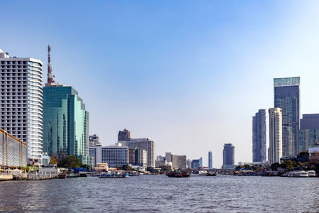 Chao Phraya River in Bangkok with modern buildings. Downtown business district urban areaのeditorial素材