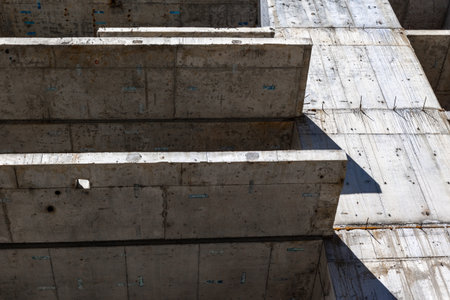 Concrete structure of a building under construction, closeup of photoの写真素材