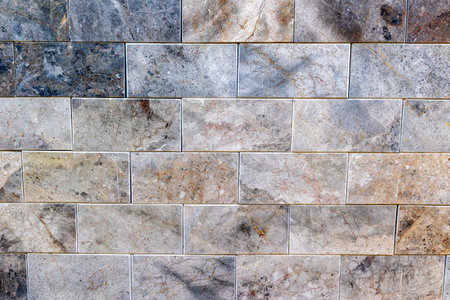 Ceramic tile wall texture. Granite building exterior. Marble stone background