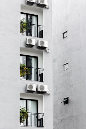 Air conditioning units on building facadeの写真素材