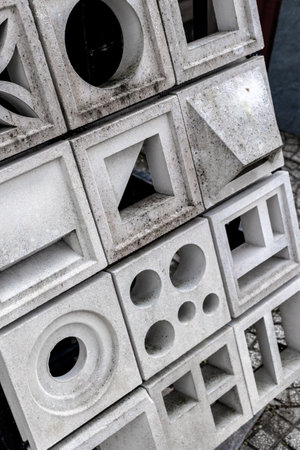 Geometric concrete blocks with varied patterns and textures.の写真素材