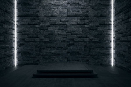 Minimalist dark stone wall with subtle lighting accents. 3d render.の写真素材
