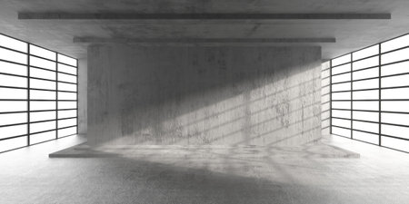 Industrial interior with concrete wall and sunlight streaming through windows. 3d render.の写真素材