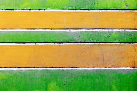 Green and yellow striped rustic wooden texture background.の写真素材