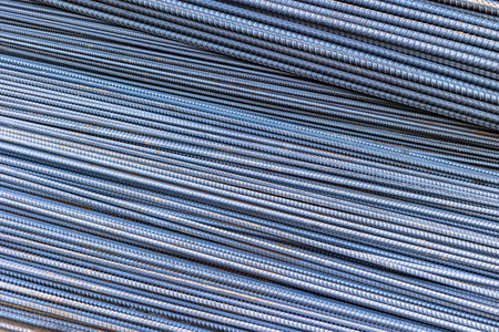 Close-up of steel rebar stacks for construction projects.の写真素材