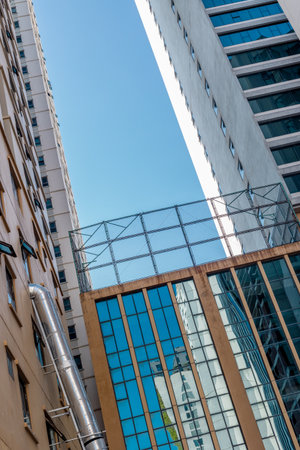 Modern urban architecture with high-rise buildings and reflective glass windows.の写真素材