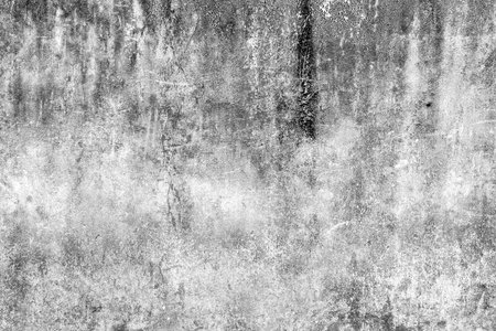 Grunge textured concrete wall surface with weathered and rough appearance.の写真素材