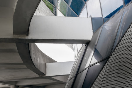 Modern architectural abstract with glass and concrete structural elements.の写真素材