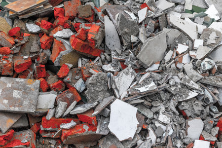 Pile of construction debris with bricks and concrete rubble.の写真素材