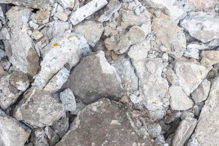 Close-up of roughly textured concrete rubble and rocks.