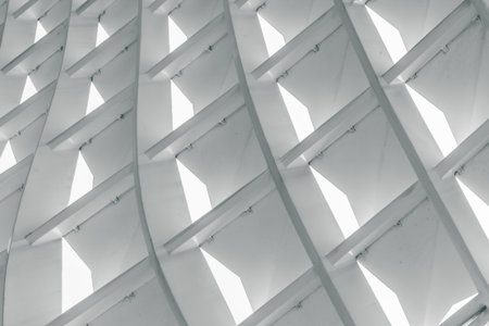 Abstract modern architectural design with geometric patterns and light play.の写真素材