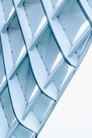 Abstract blue geometric structure with repetitive patterns and modern design.の写真素材