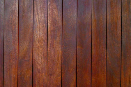 Richly textured wooden planks in warm brown tones.の写真素材