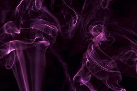 Motion of purple smoke, smoky backgroundの写真素材