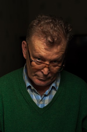 Portrait of senior confident man in casual cloth and eyeglasses