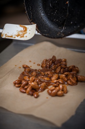 Preparing almond caramel on restaraunt kitchenの写真素材
