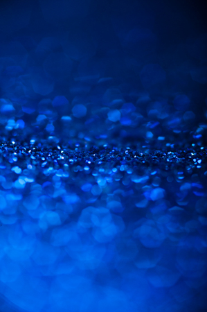 Blue glitter background. Abstract bokeh lightsの写真素材