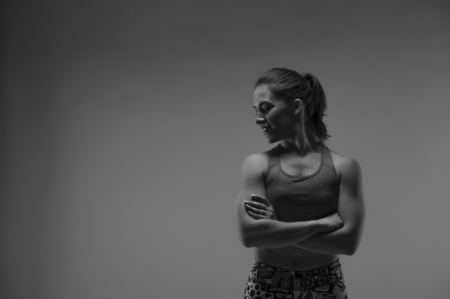 Fit sporty woman posing on white backgroundの写真素材