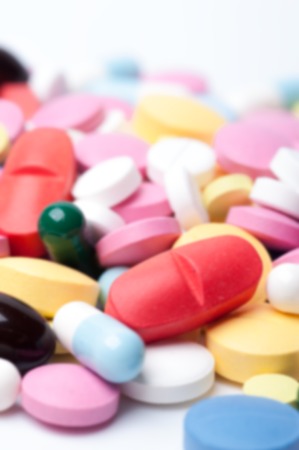 Group of multicolored medical pills and capsules