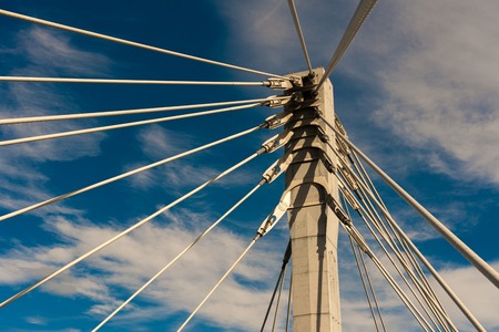 Cable stayed bridge against blue sky, closeupの写真素材