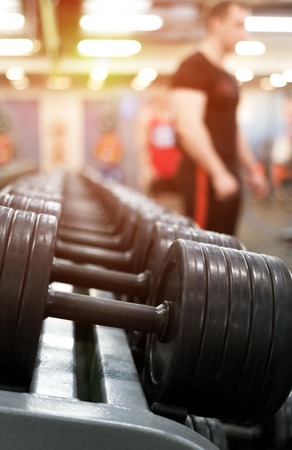 Different dumbbell weights in fitness centerの写真素材