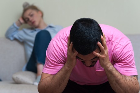 Unhappy couple having conflict after argumentの写真素材