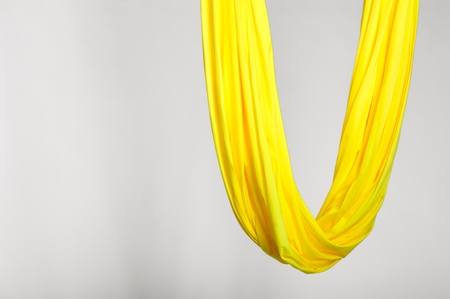 Yellow hammock on white backgroundの写真素材