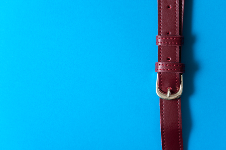 Detail Leather bag on blue background, closeup.の写真素材