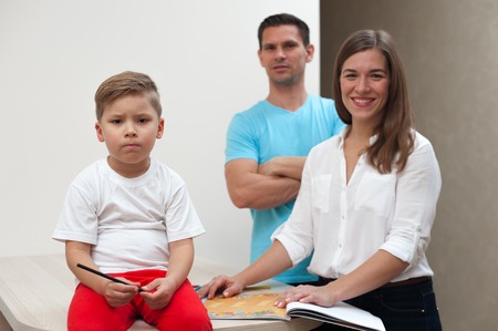 Happy Family posing indoorsの写真素材