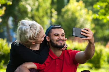 Young couple posing on natureの写真素材