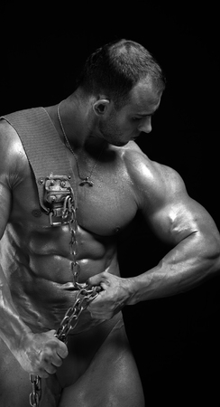 Male bodybuilder with relief trained bodyの写真素材