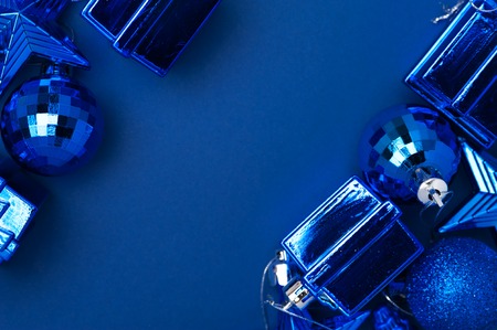 Blue Christmas decoration toys on blue background