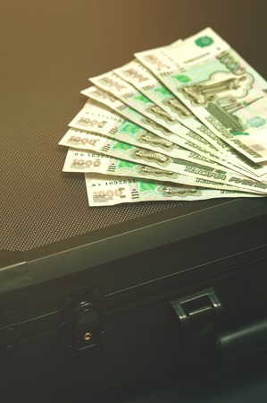 Black suitcase with russian rubles.の写真素材