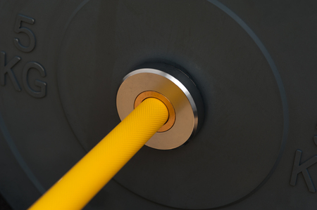 Close up of yellow barbell gripの写真素材
