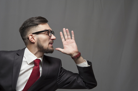 Portrait of an emotional happy businessmanの写真素材