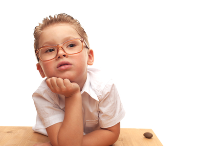 Funny cute little boy posing on white backgroundの写真素材