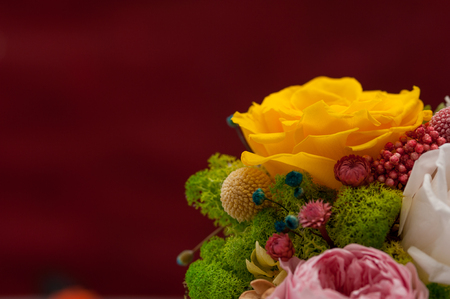 Yellow rose in pink bouquet with hydrangeaの写真素材