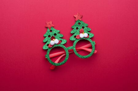 Funny eyeglasses in the form of Christmas treeの写真素材