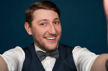 Close-up portert of a positive young manの写真素材