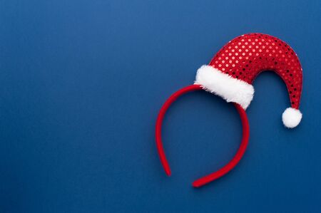 Christmas Red Headband With Santa Claus Hatの写真素材