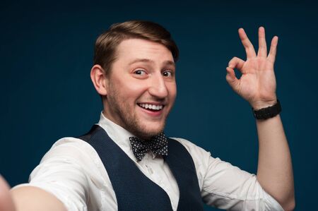 Close-up portert of a positive young manの写真素材