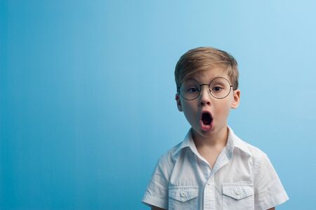 Little funny emotional cute crazy boy