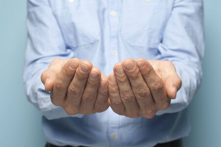 Close-up hands of an unidentified man