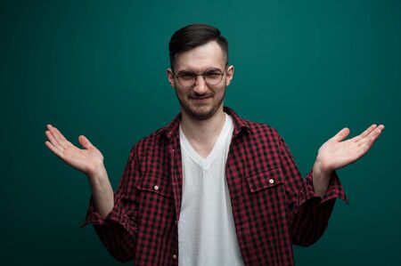 Portrait of a funny young interested man