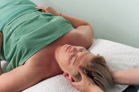Masseuse woman massage the shouldersの写真素材